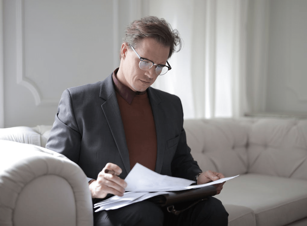 A certified USCIS translation officer rechecking the documents
