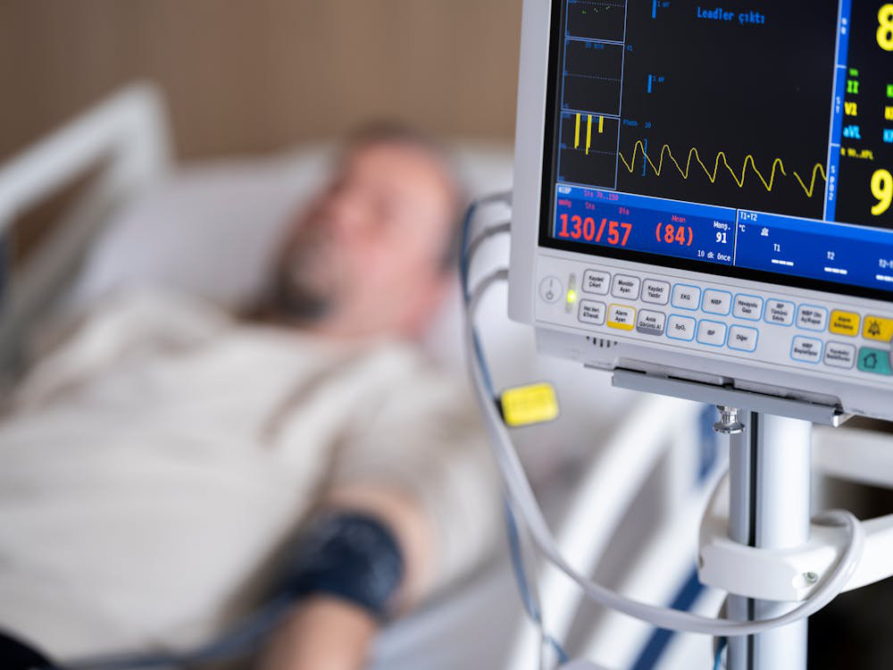 patient whose blood pressure and pulse are measured in the hospital