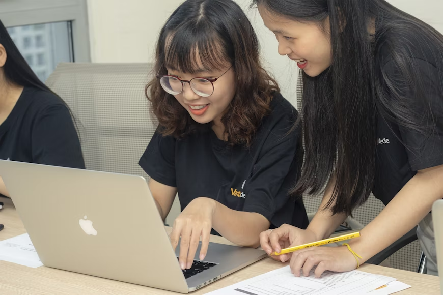 A student completes a university assignment. 
