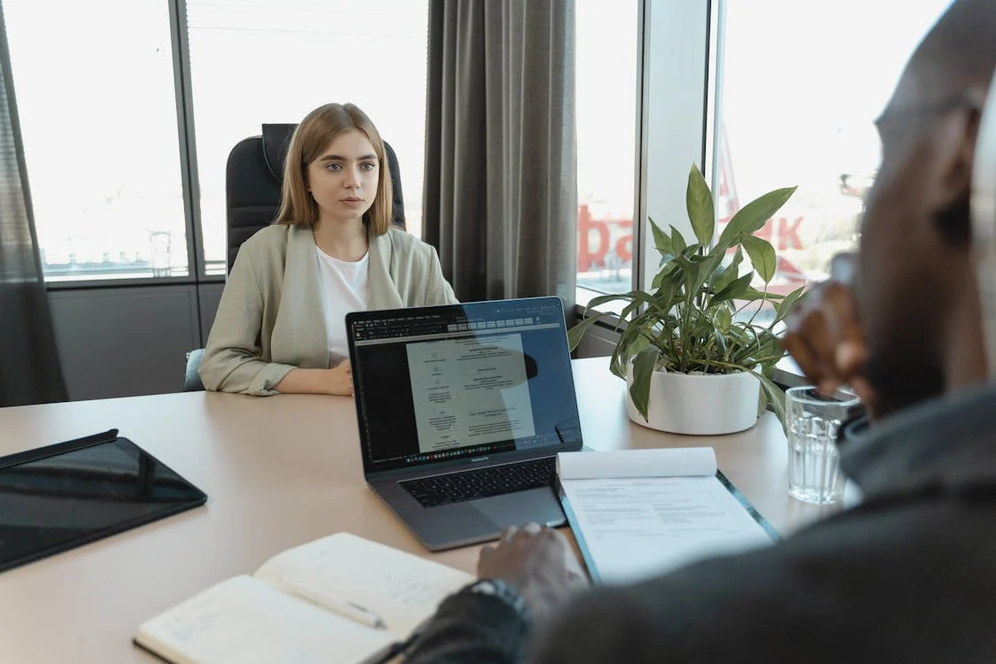 A business owner works with a translator.