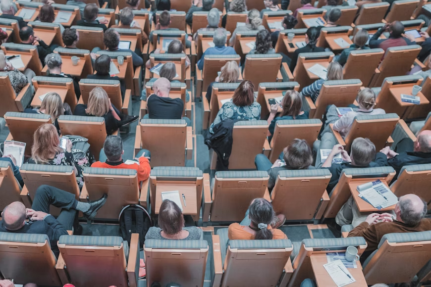 A diverse classroom with students of all ages.