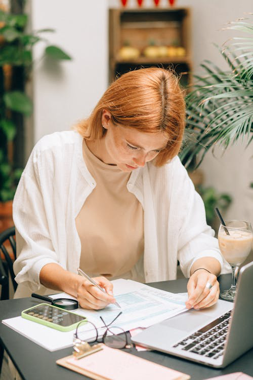 a woman going over important documents