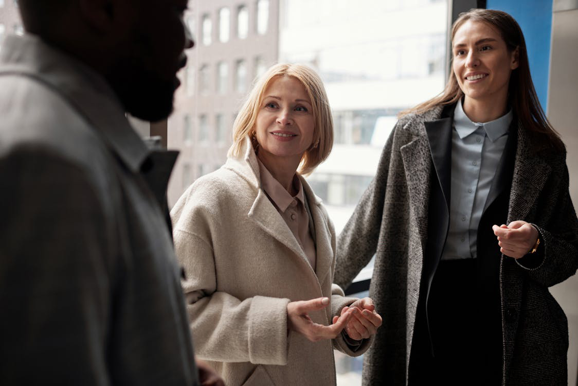 clients having a discussion with their attorney. 
