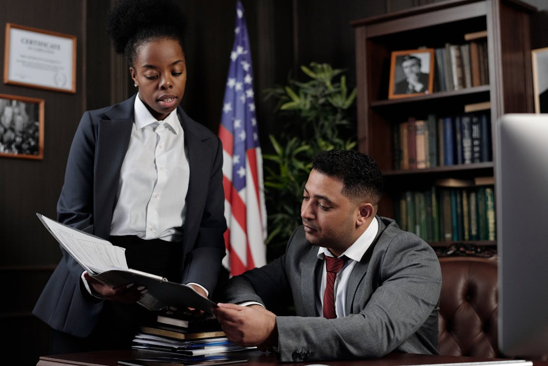 Two lawyers in a conversation.
