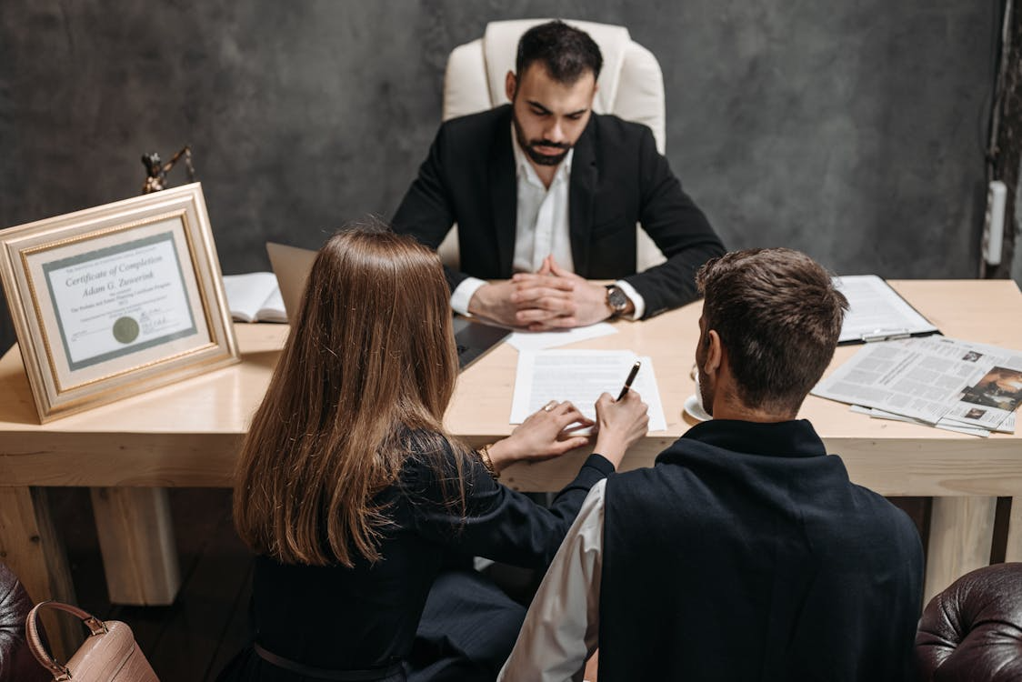 clients consulting a lawyer.