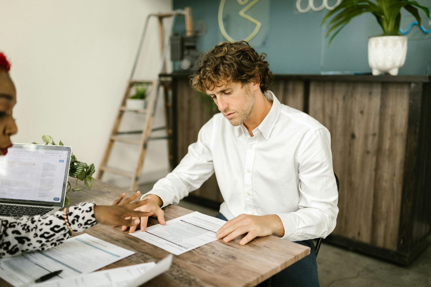 Person looking at tender documents