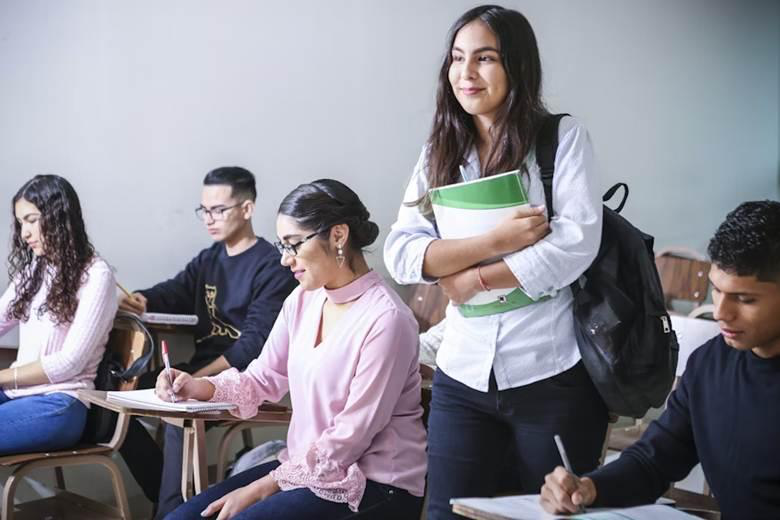 A student successfully participates in a classroom.