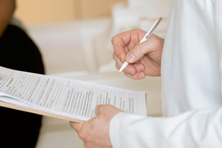 A person reviewing medical document translation with back-translation technique
