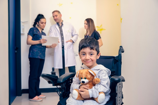 This photo shows a doctor explain documents to a patient family