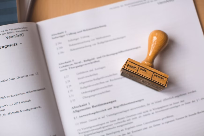 a document with a wooden stamp on it