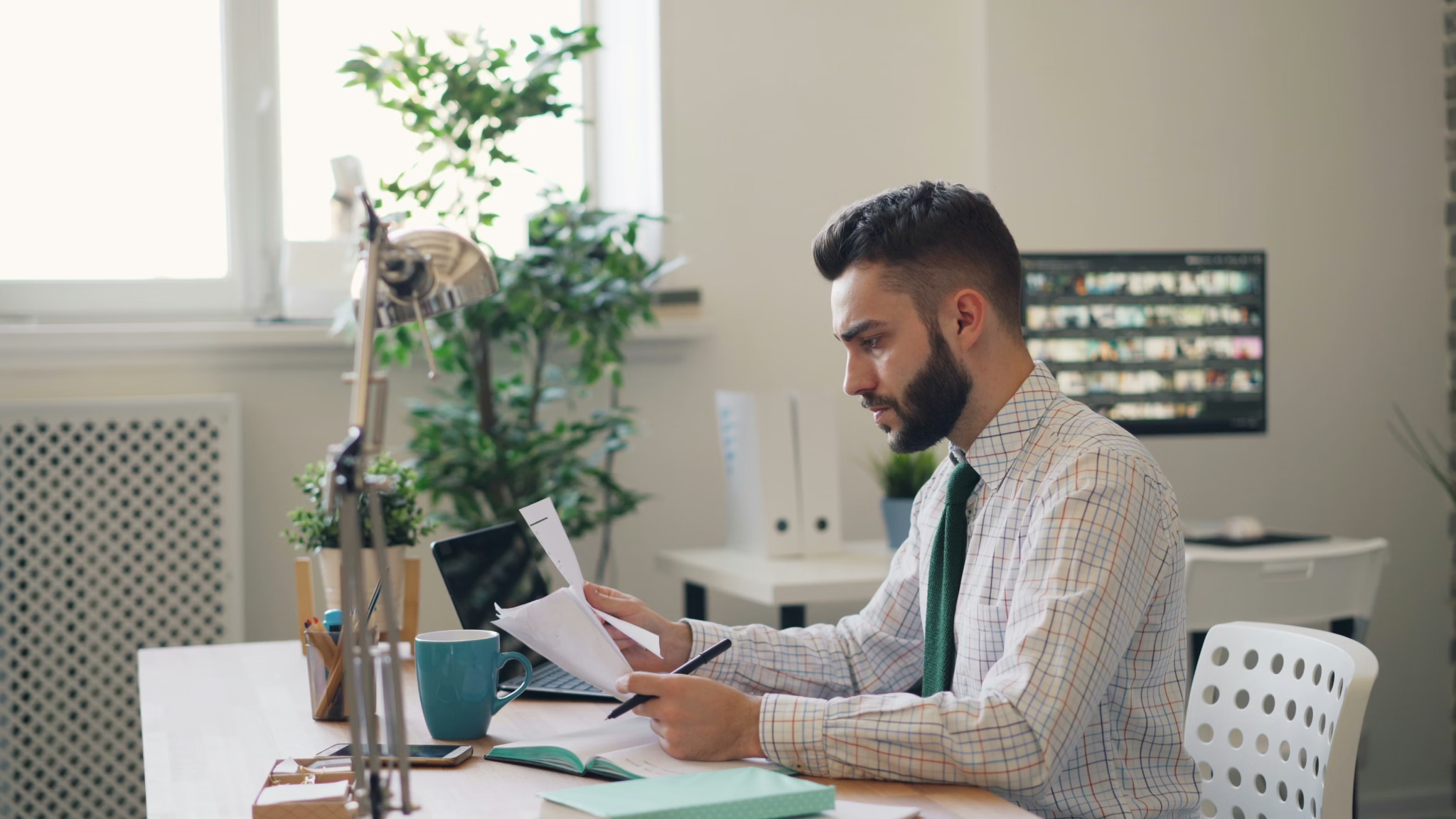 Man reviewing official paperwork related to apostille validation for Hague Convention countries
